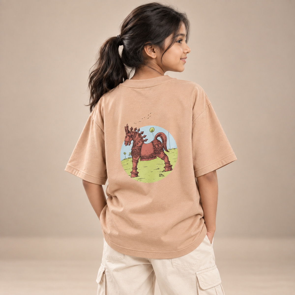 Girl wearing Terracotta Horse kids & teens oversized cotton t-shirt in orange