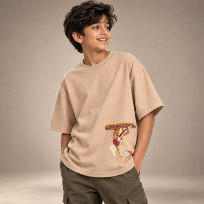 Boy wearing Ravana kids & teens oversized cotton t-shirt in orange