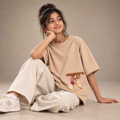 Girl wearing Ravana kids & teens oversized cotton t-shirt in orange