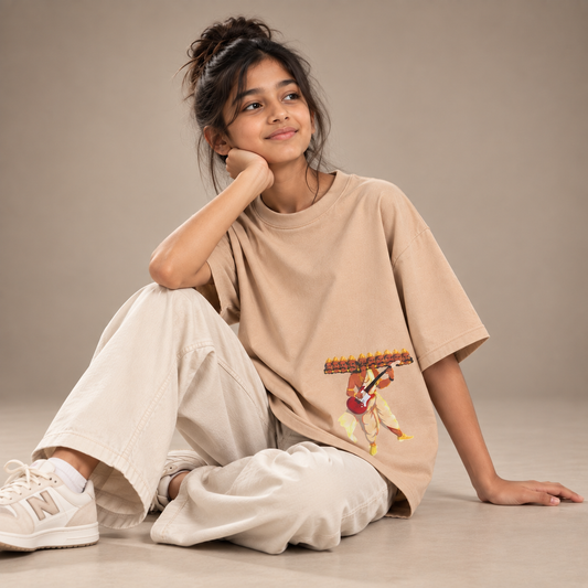 Girl wearing Ravana kids oversized cotton t-shirt in orange